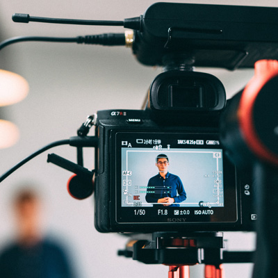 Man being interviewed on camera